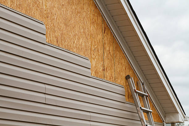 Professional Siding Replacement technician working in Nicktown, PA